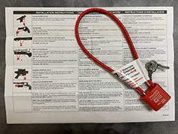 photo of a gun safety lock and instructions for use