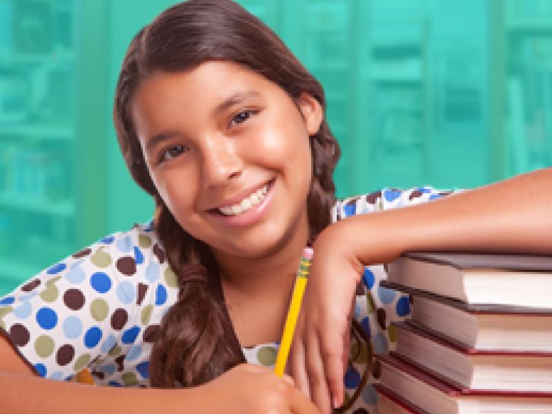 Image of a girl in a library.