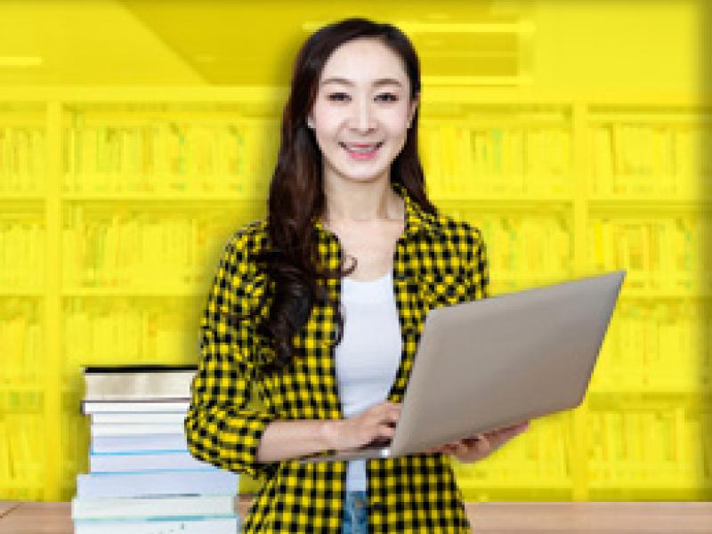 image of a librarian holding a laptop