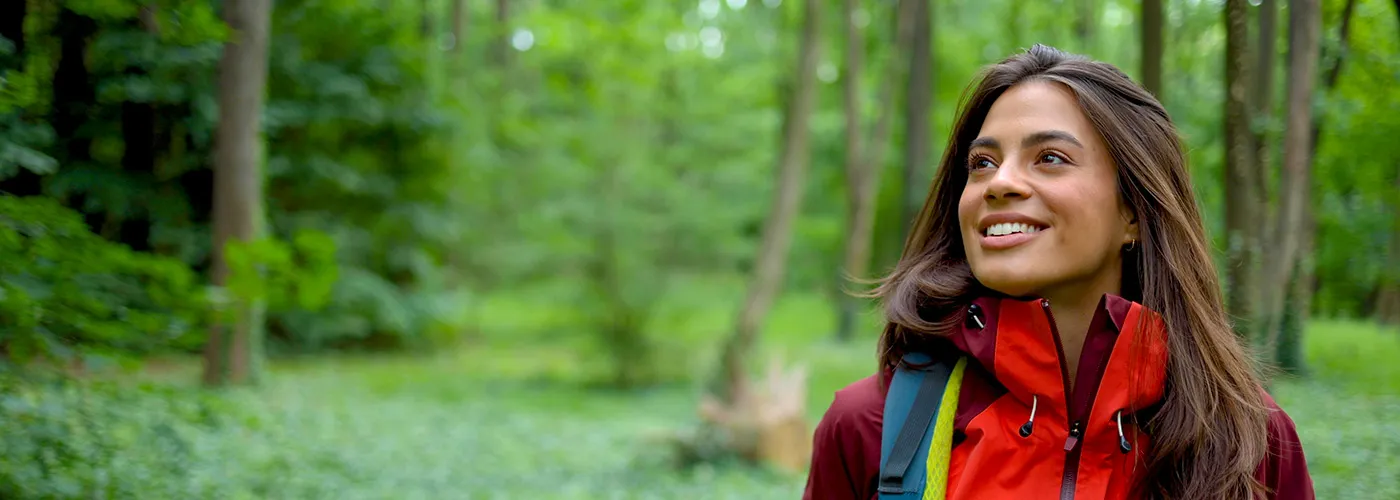 Photo of a woman enjoying a hike