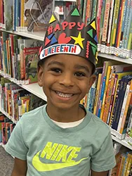 Young boy wearing a Juneteenth crown